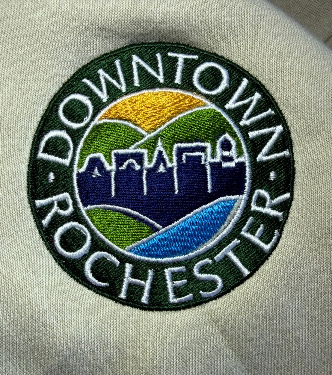 Downtown Rochester embroidered badge detail